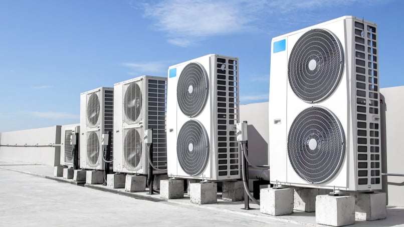 Air conditioners (HVAC) installed on the roof of industrial buildings.