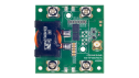 Top view of the EVB-RTP100E2P6G1FL evaluation board showing the RTP100E2P6G1FL GaN FET, onboard components, test points, and input/output connection terminals