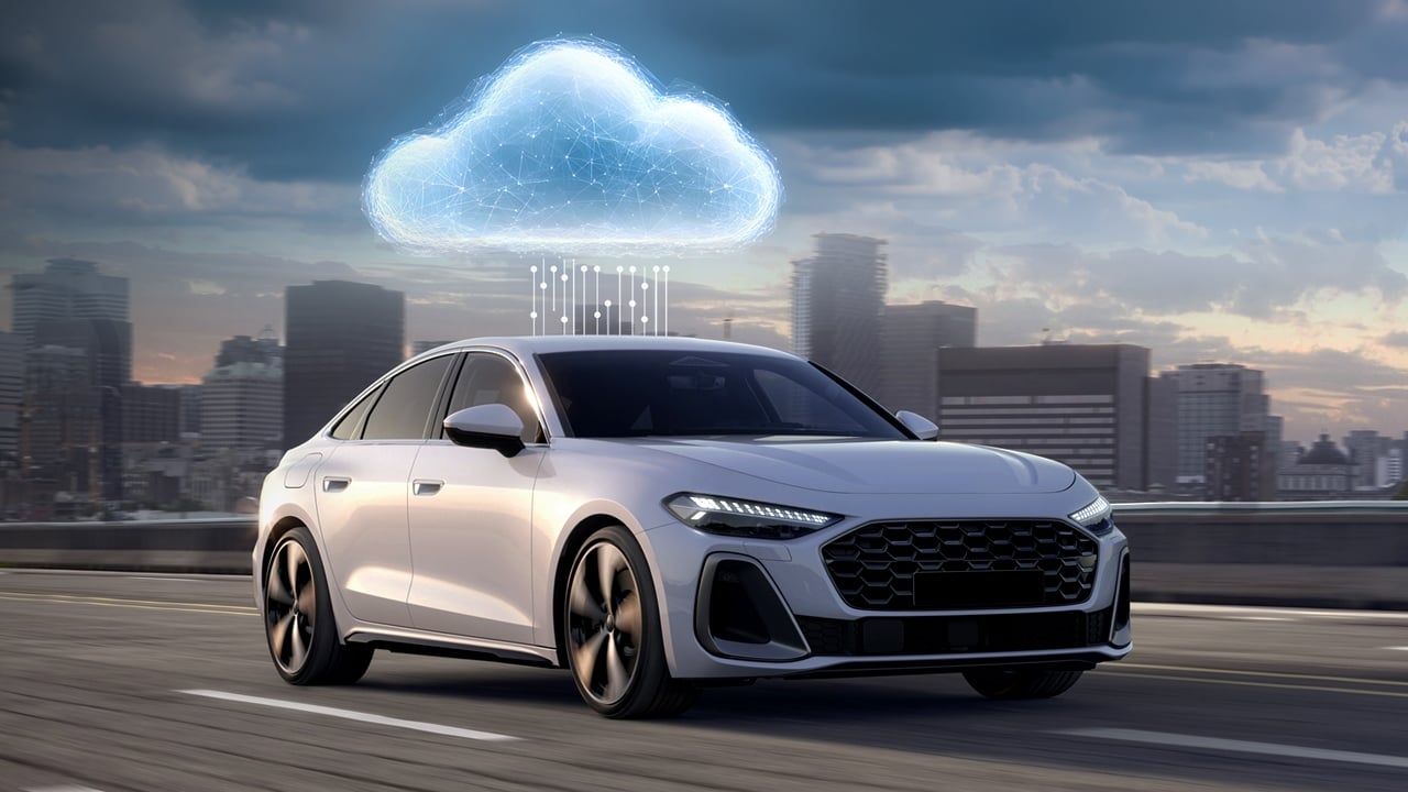 Car running on road with a cityscape background and a cloud graphic on top of car connected with vertical connectivity lines indicating ADAS cloud development.