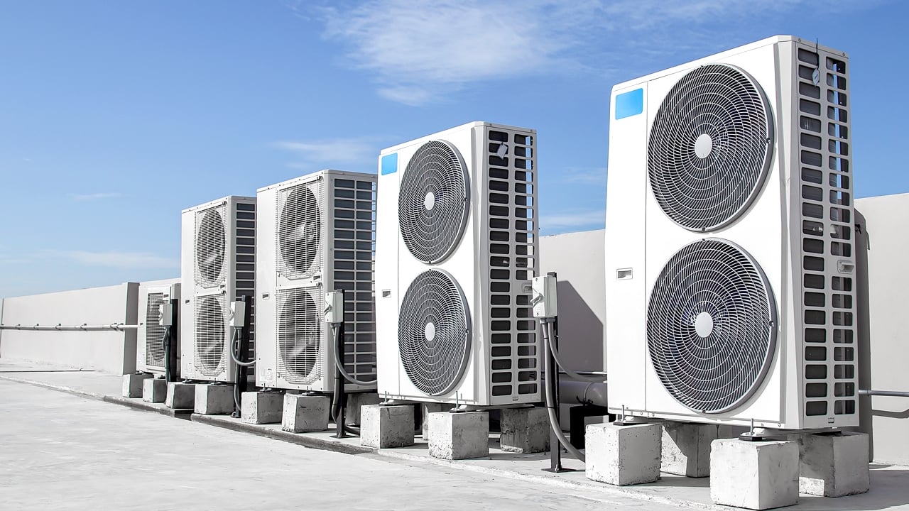 Air conditioners (HVAC) installed on the roof of industrial buildings.